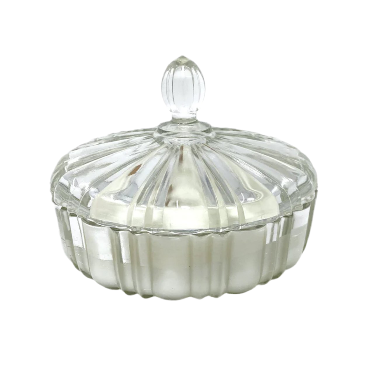 Clear glass candy dish with a lid on a white background