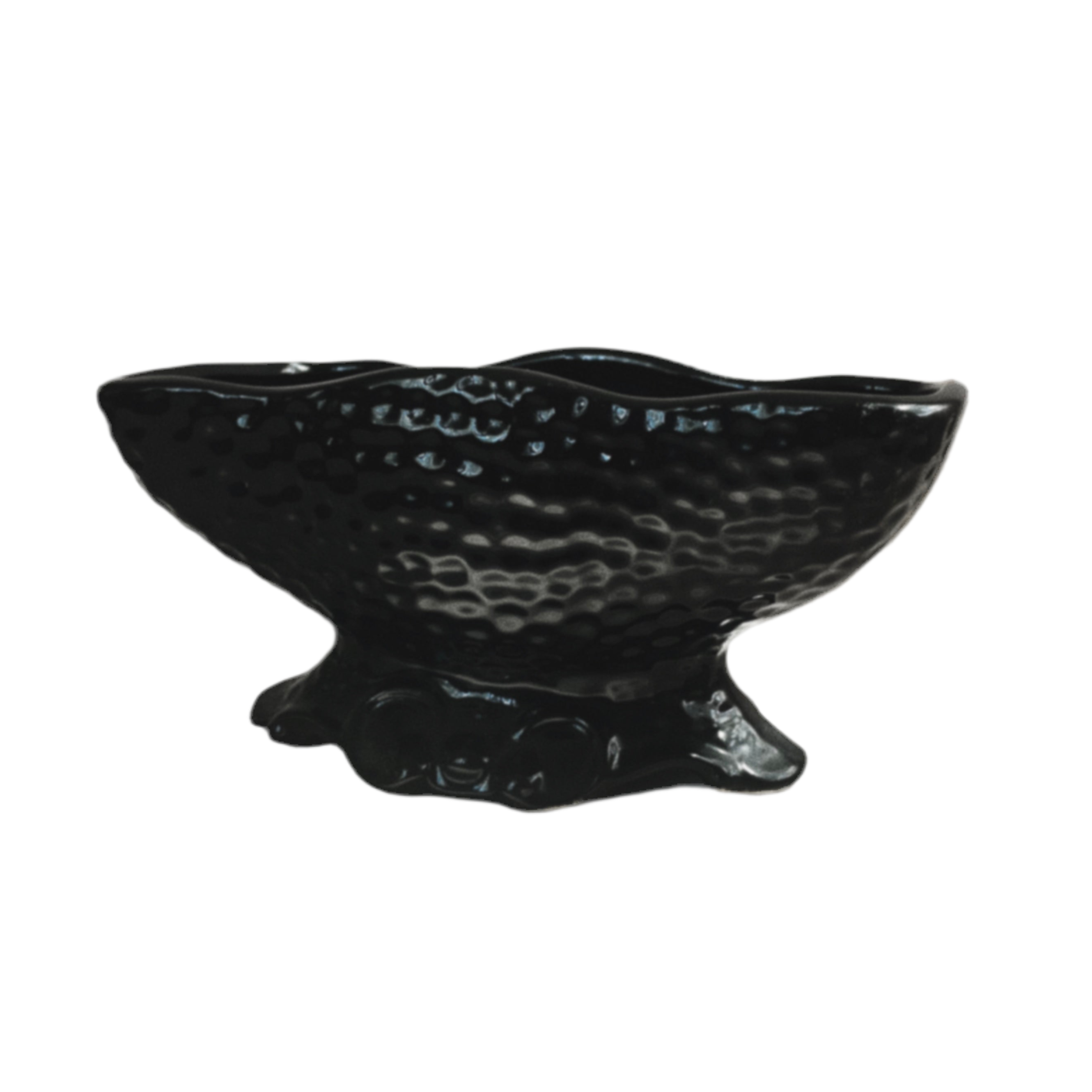 Black ceramic leaf-shaped bowl on a white background