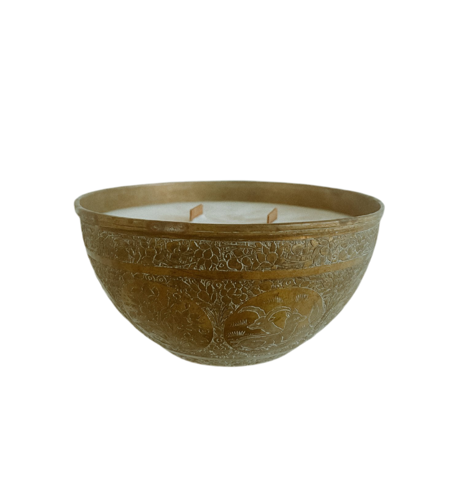 Decorative brass candle with intricate patterns 