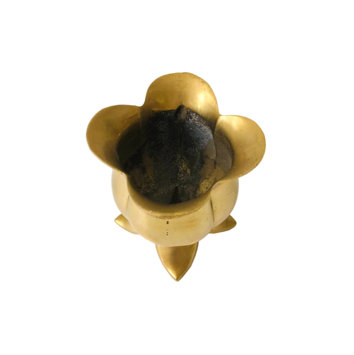 Brass flower-shaped container on a white background