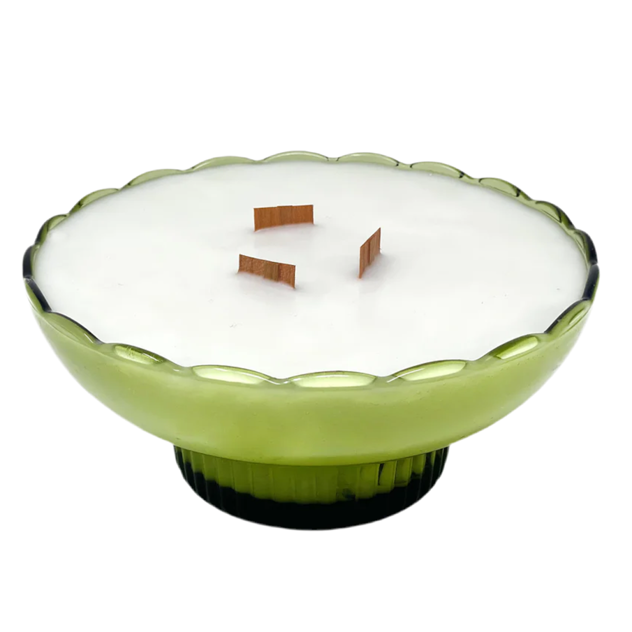 Green candle holder with a white candle inside on a white background
