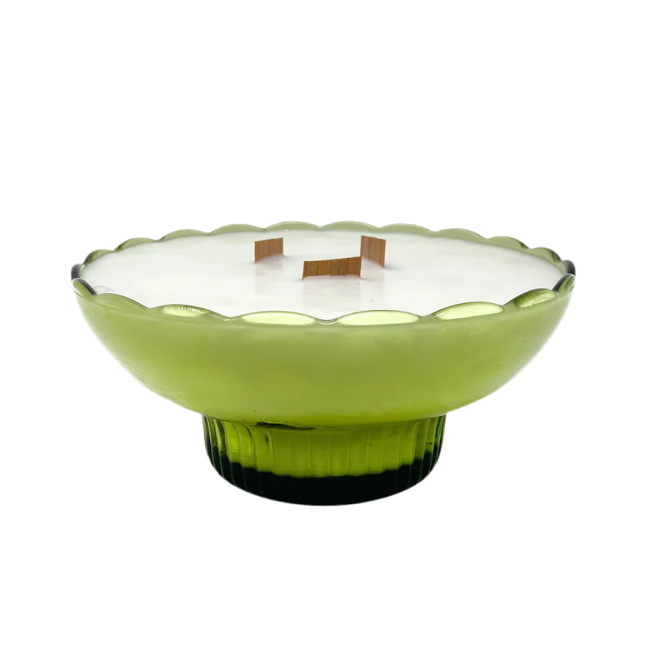 Green glass bowl with scalloped edge on a white background